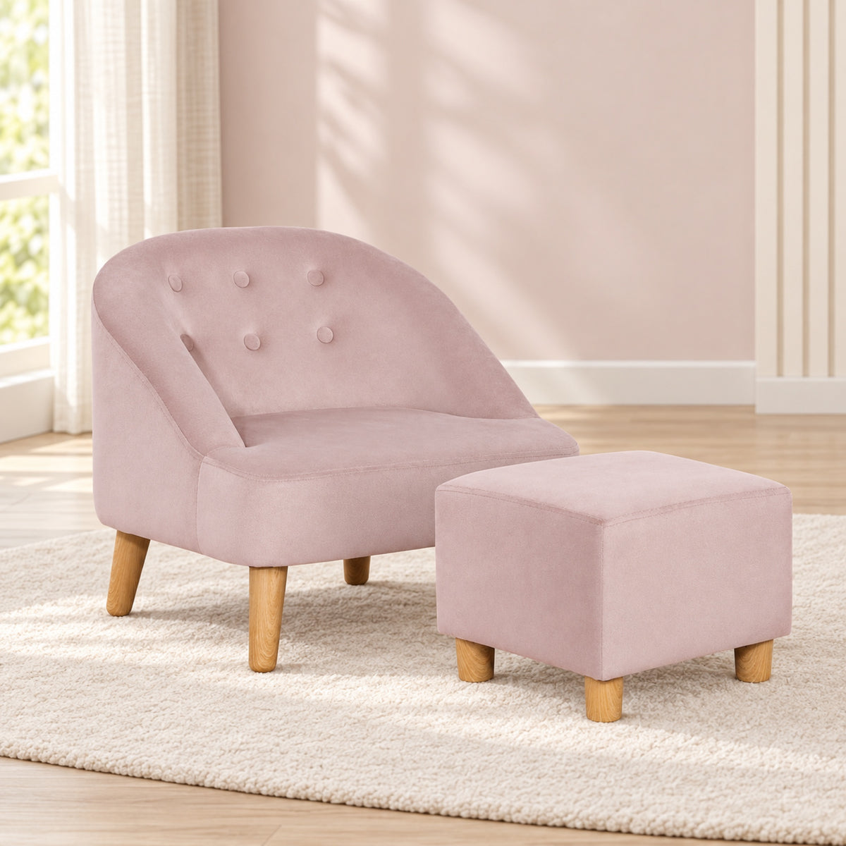 Fauteuil enfant en velours rose avec pouf assorti, vue principale
