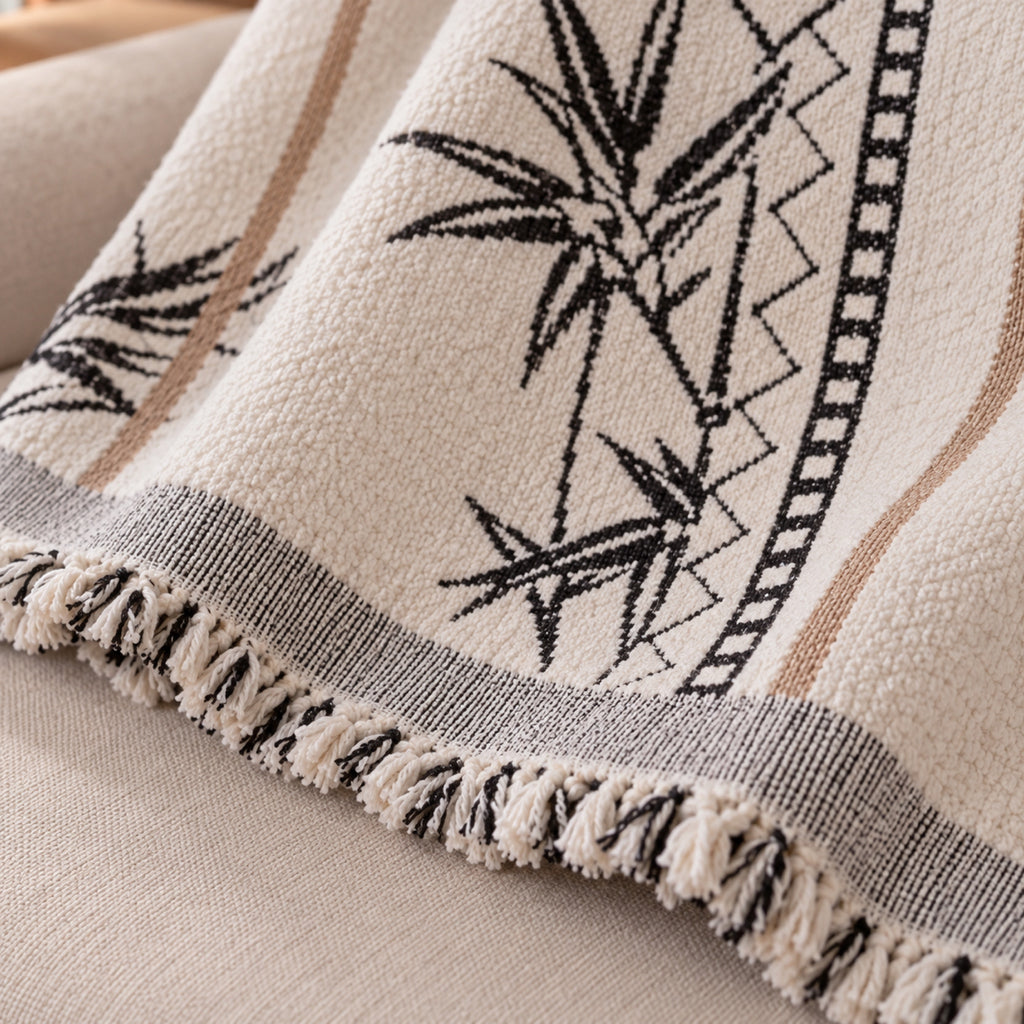 Jeté de canapé jacquard à glands, carreaux ou bambou, détail de fabrication, coloris Crème motif bambou